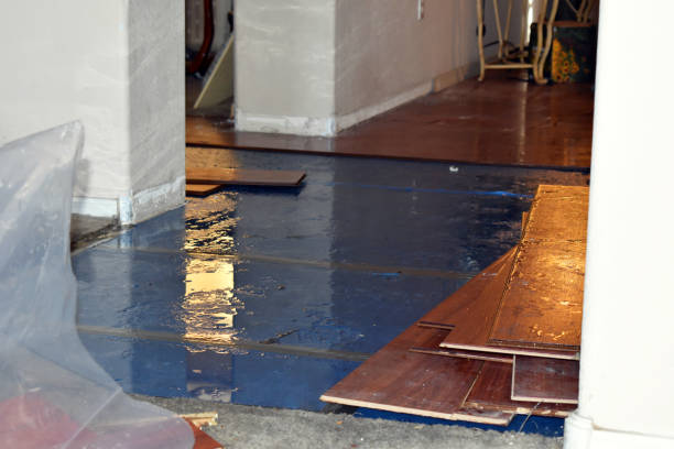 Professional Emergency Water Damage Restoration technician working in Amherst, NH